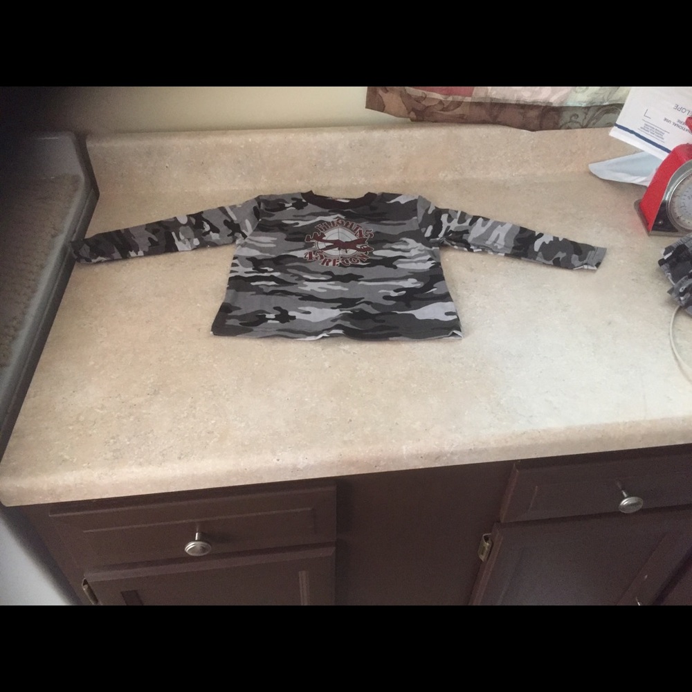 Boy Shirt Height 34-37.5” Weight 30.5-34 Pounds.